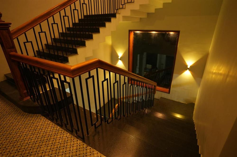 Staircase with a wooden handrail